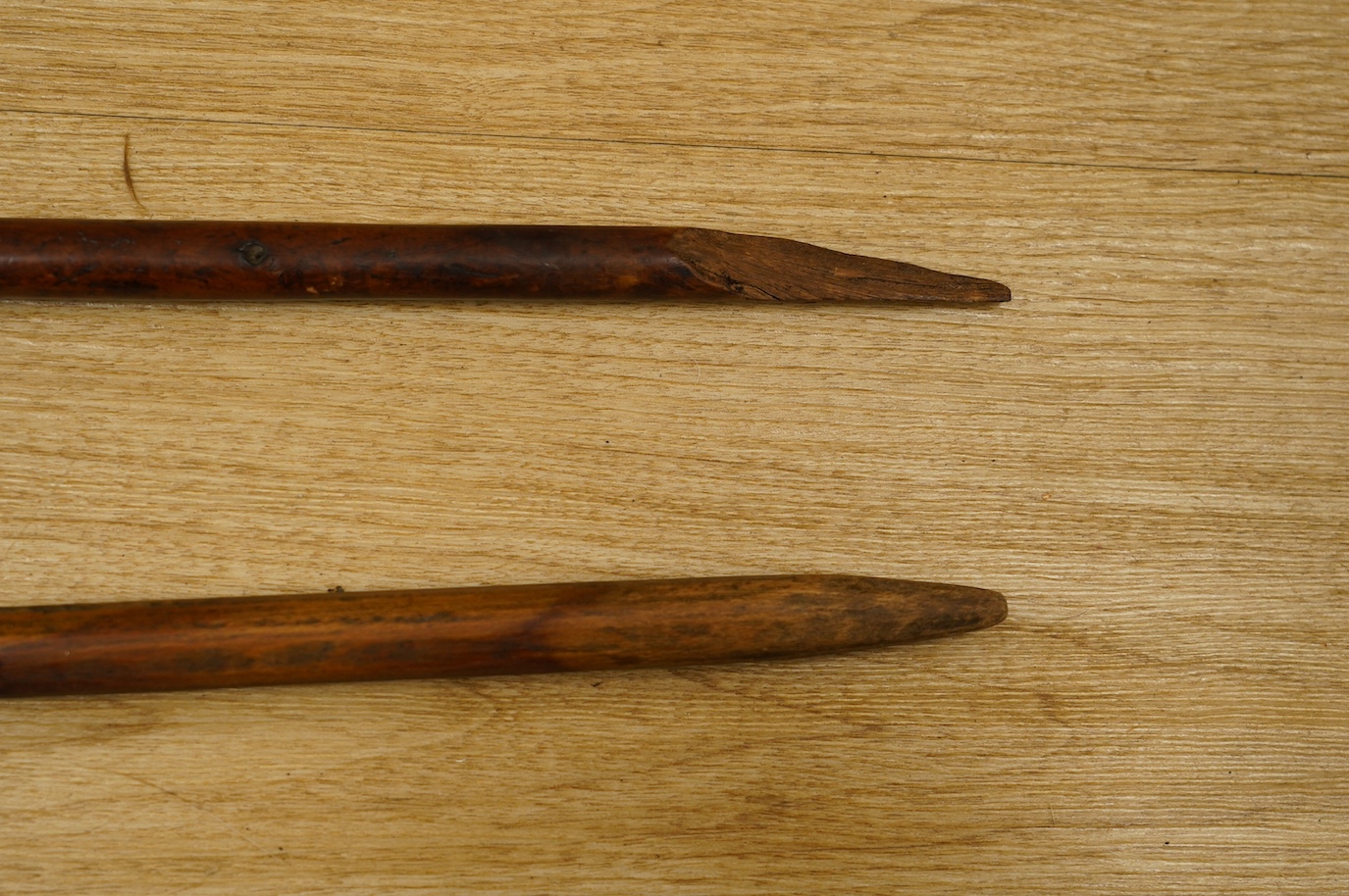 Three 19th century Russian or Eastern European treen distaffs, longest 77cm. Condition - fair to good, one with missing bottom section